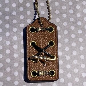 Coach Custom Dinosaur and Leather Stitch Hang Tag
